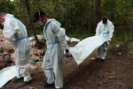 İşgəncə verdilər, sonra edam etdilər: Kiyevdə dinc əhalinin daha bir kütləvi məzarlığı tapıldı